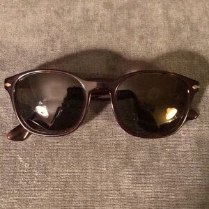 Persol tortoise shell frame sunglasses.